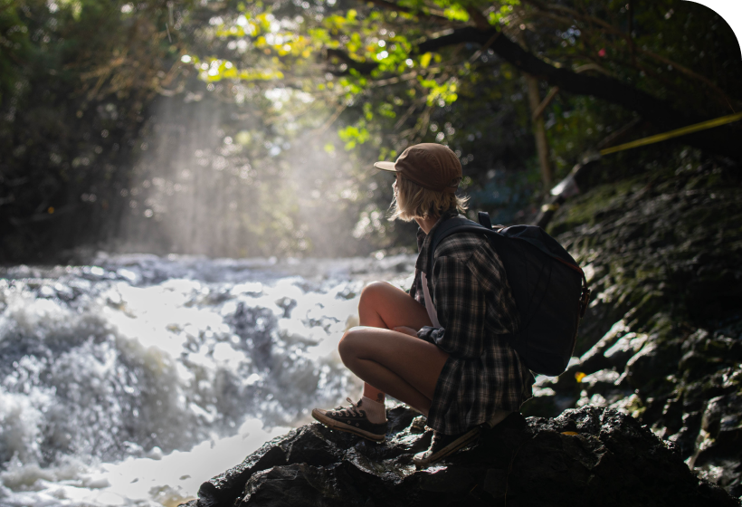 Person by waterfall